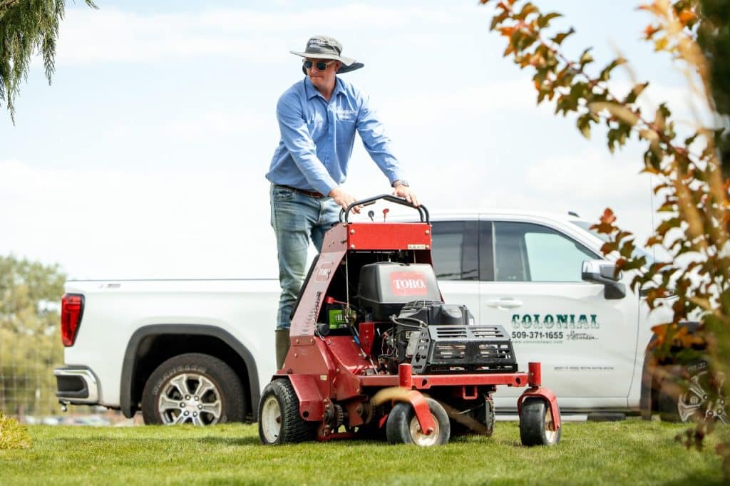 mowing the lawn in summer